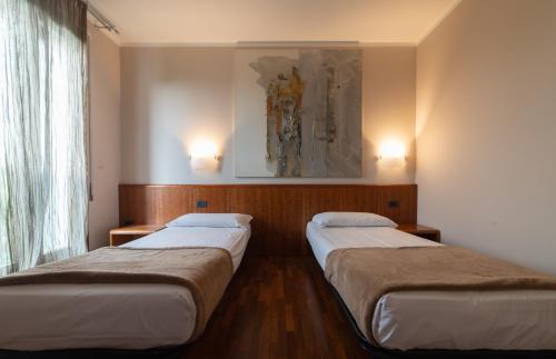 Imagen de la habitación del Hotel HOTEL QUERINI Essential Business Sandrigo. Foto 17