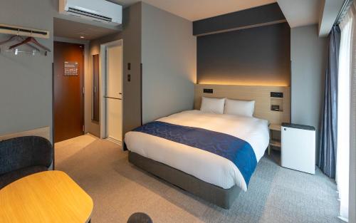 Imagen de la habitación del Hotel HOTEL R9 Premium Ichikawaekimae. Foto 9