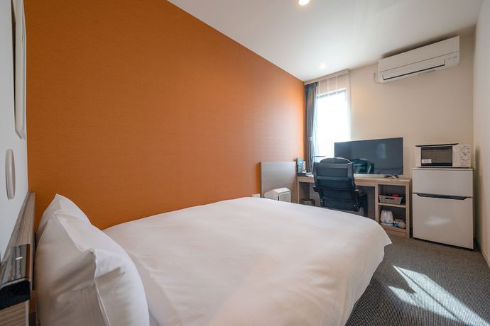 Imagen de la habitación del Hotel HOTEL R9 The Yard Futtsu. Foto 11