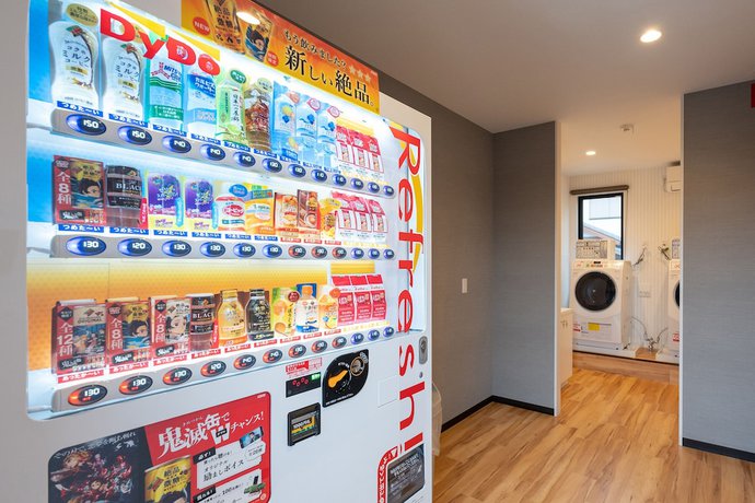 Imagen de los interiores del Hotel HOTEL R9 The Yard Futtsu. Foto 14