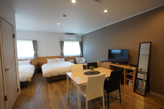 Imagen de la habitación del Hotel HOTEL R9 The Yard Honjo. Foto 15