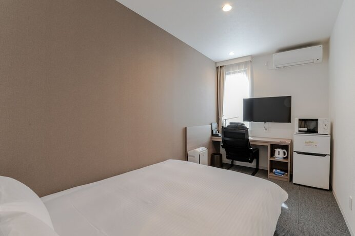 Imagen de la habitación del Hotel HOTEL R9 The Yard Kaizu. Foto 16