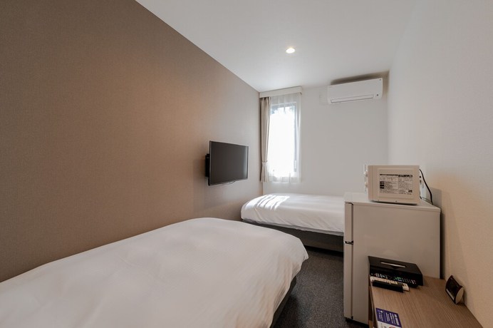Imagen de la habitación del Hotel HOTEL R9 The Yard Kikuchi. Foto 12