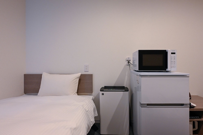 Imagen de la habitación del Hotel HOTEL R9 The Yard Marugame. Foto 11