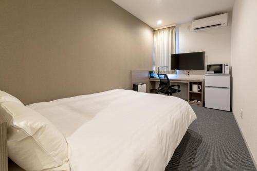 Imagen de la habitación del Hotel HOTEL R9 The Yard Oizumi, 大泉町. Foto 19