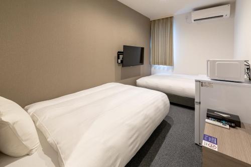Imagen de la habitación del Hotel HOTEL R9 The Yard Oizumi, 大泉町. Foto 20