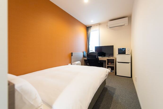 Imagen de la habitación del Hotel HOTEL R9 The Yard Oyamayokokura. Foto 17