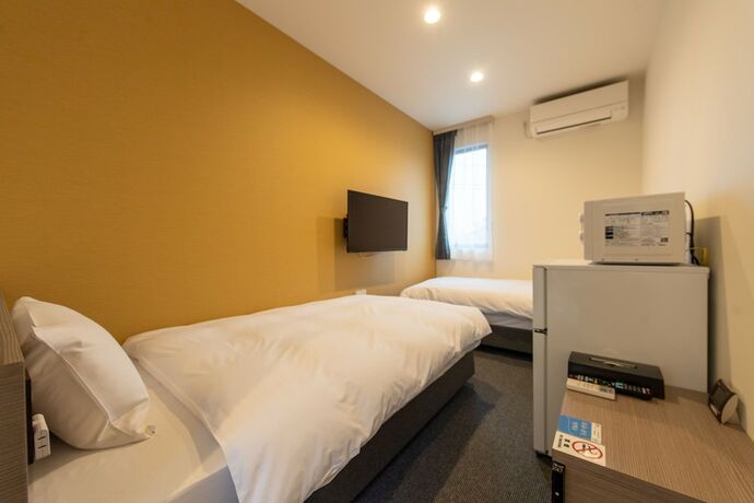 Imagen de la habitación del Hotel HOTEL R9 The Yard Oyamayokokura. Foto 18