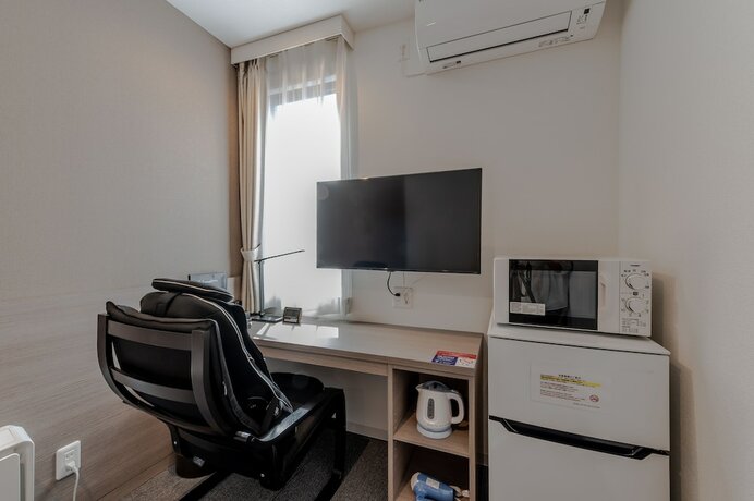 Imagen de la habitación del Hotel HOTEL R9 The Yard Shikokuchuo. Foto 15
