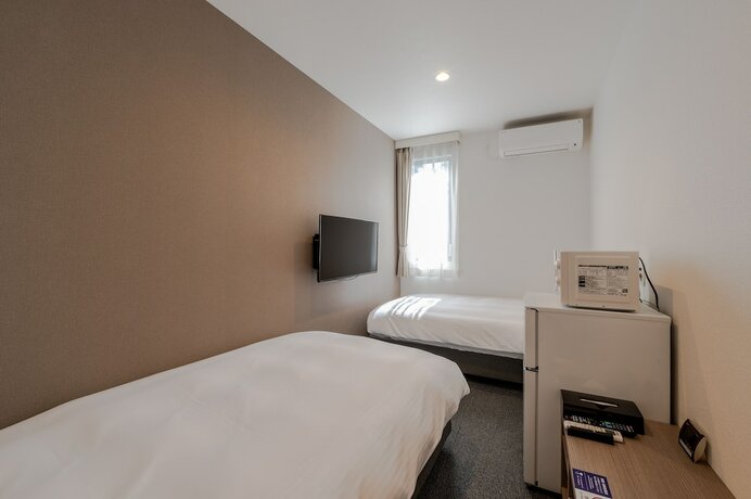 Imagen de la habitación del Hotel HOTEL R9 The Yard Tsu. Foto 17