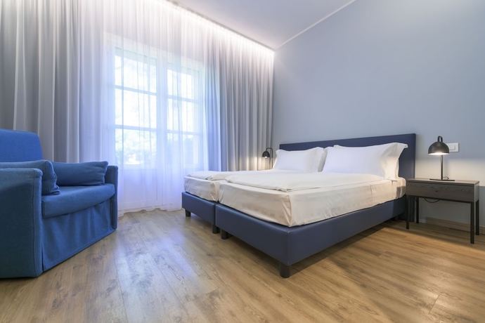 Imagen de la habitación del Hotel HOTEL REGINA DEL GARDA SUITE. Foto 4