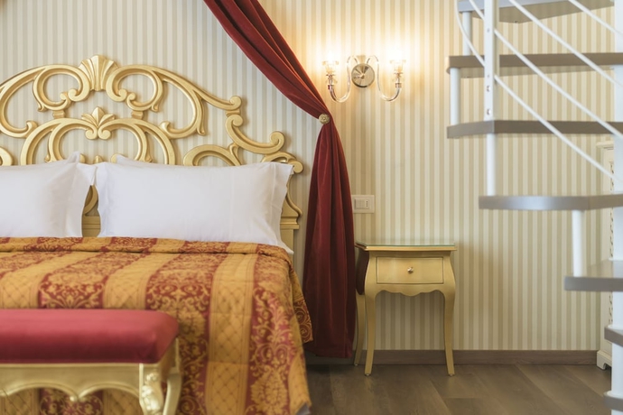 Imagen de la habitación del Hotel HOTEL REGINA DEL GARDA SUITE. Foto 11