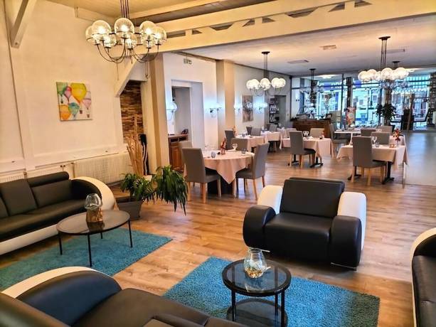 Imagen del bar/restaurante del Hotel HOTEL RESTAURANT HERARD. Foto 4