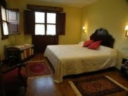 Imagen de la habitación del Hotel HOTEL RURAL EL BUHO DE LA REMOLINA. Foto 3