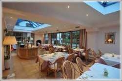 Imagen del bar/restaurante del Hotel HOTEL ST. FLORIAN - KAPRUN. Foto 2