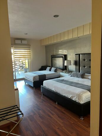 Imagen de la habitación del Hotel HOTEL TIERRA ROJA. Foto 17