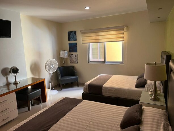 Imagen de la habitación del Hotel HOTEL TIERRA ROJA. Foto 18
