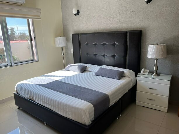 Imagen de la habitación del Hotel HOTEL TIERRA ROJA. Foto 19