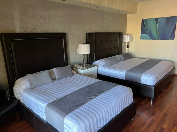 Imagen de la habitación del Hotel HOTEL TIERRA ROJA. Foto 20