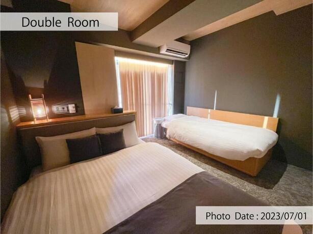 Imagen de la habitación del Hotel HOTEL TOMOS ASAKUSA. Foto 17