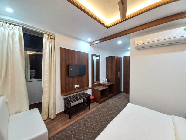 Imagen de la habitación del Hotel HOTEL The Rich Grand. Foto 11