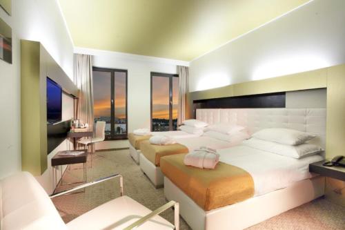 Imagen de la habitación del Hotel HOTI II RIZO ULCINJ. Foto 19