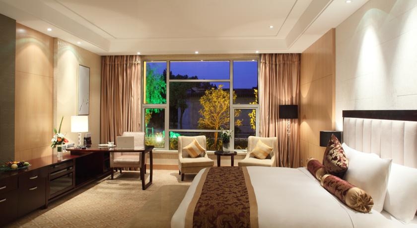 Imagen de la habitación del Hotel HOWARD JOHNSON JINGSI GARDEN. Foto 3