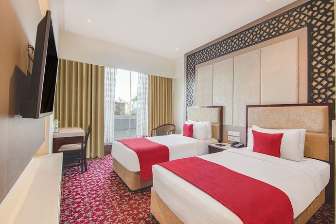 Imagen de la habitación del Hotel HRJ Sarovar Portico Indore. Foto 4