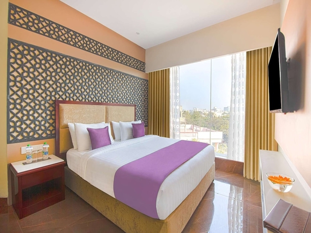 Imagen de la habitación del Hotel HRJ Sarovar Portico Indore. Foto 11