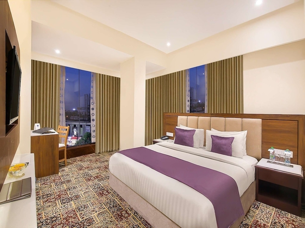 Imagen de la habitación del Hotel HRJ Sarovar Portico Indore. Foto 13