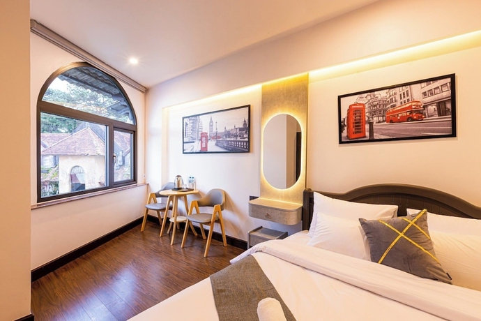 Imagen de la habitación del Hotel HT House. Foto 6