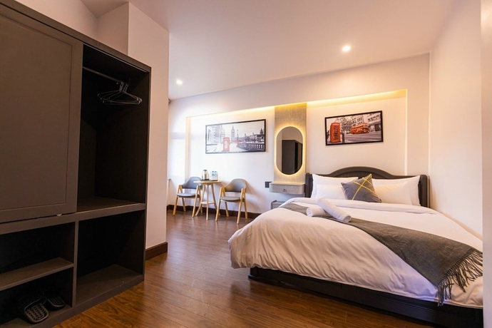 Imagen de la habitación del Hotel HT House. Foto 7