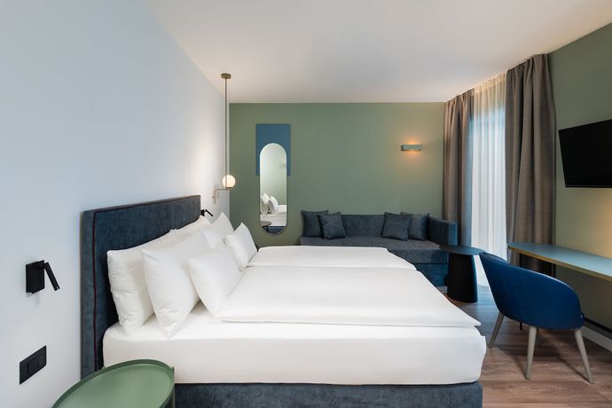 Imagen de la habitación del Hotel HT Trieste. Foto 2
