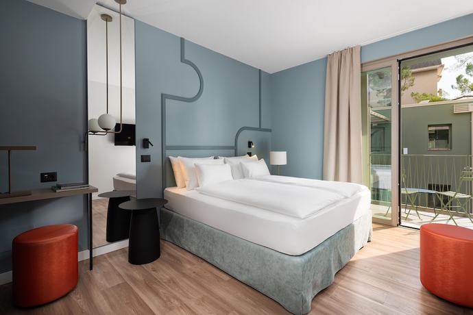 Imagen de la habitación del Hotel HT Trieste. Foto 3
