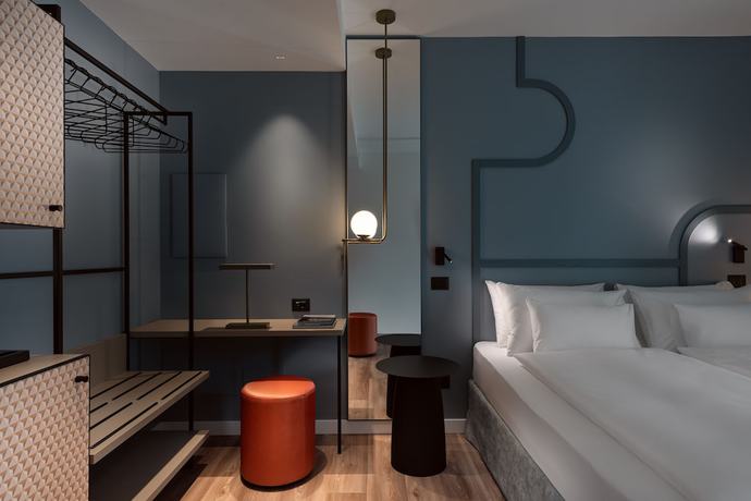 Imagen de la habitación del Hotel HT Trieste. Foto 4