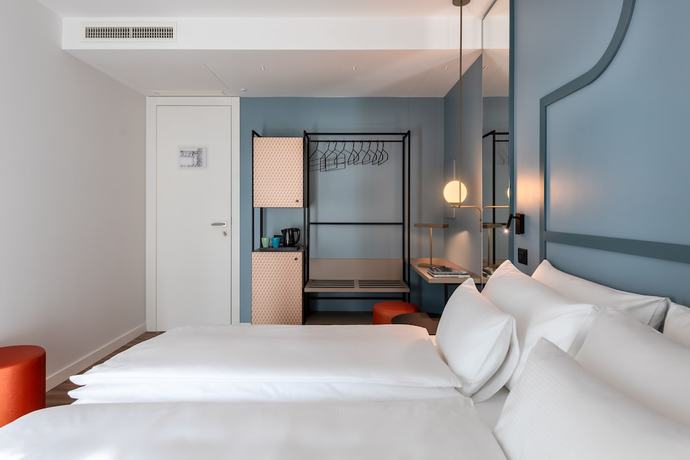 Imagen de la habitación del Hotel HT Trieste. Foto 5