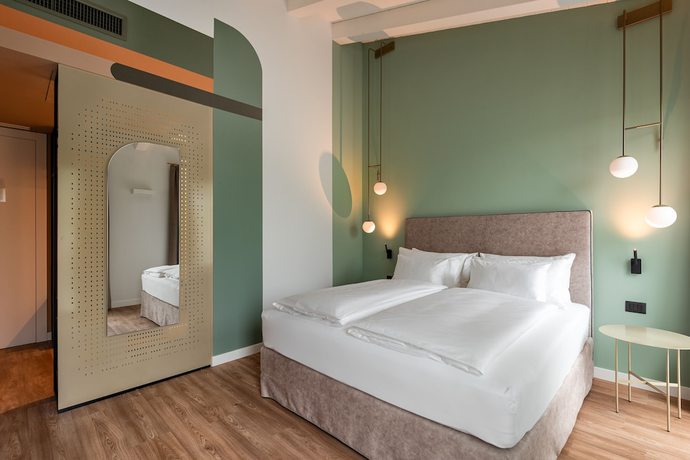 Imagen de la habitación del Hotel HT Trieste. Foto 7
