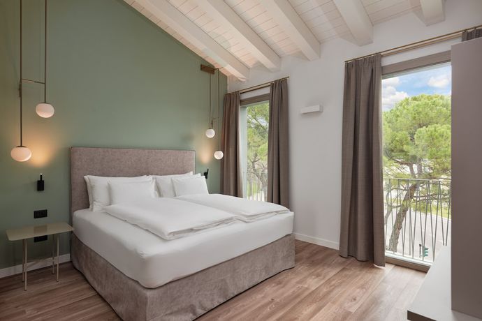 Imagen de la habitación del Hotel HT Trieste. Foto 8