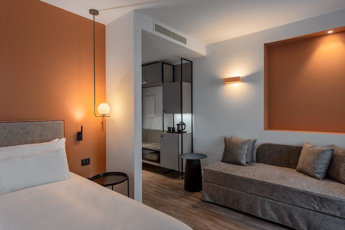 Imagen de la habitación del Hotel HT Trieste. Foto 9