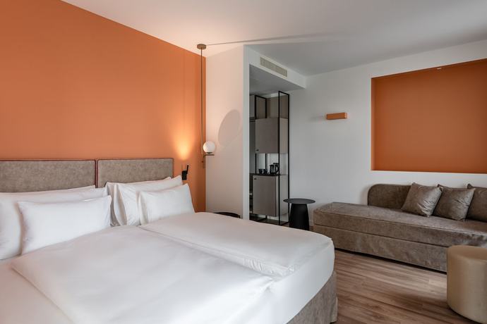 Imagen de la habitación del Hotel HT Trieste. Foto 10