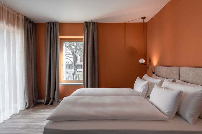 Imagen de la habitación del Hotel HT Trieste. Foto 11