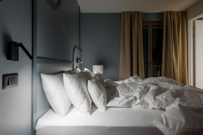 Imagen de la habitación del Hotel HT Trieste. Foto 12