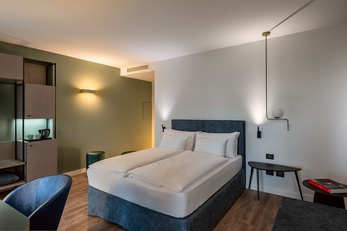Imagen de la habitación del Hotel HT Trieste. Foto 16