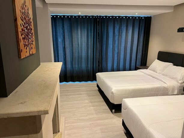 Imagen de la habitación del Hotel HTL. Foto 9