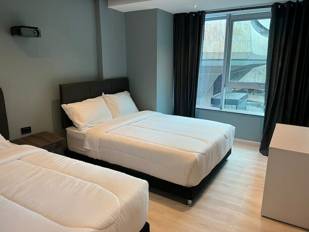 Imagen de la habitación del Hotel HTL. Foto 11