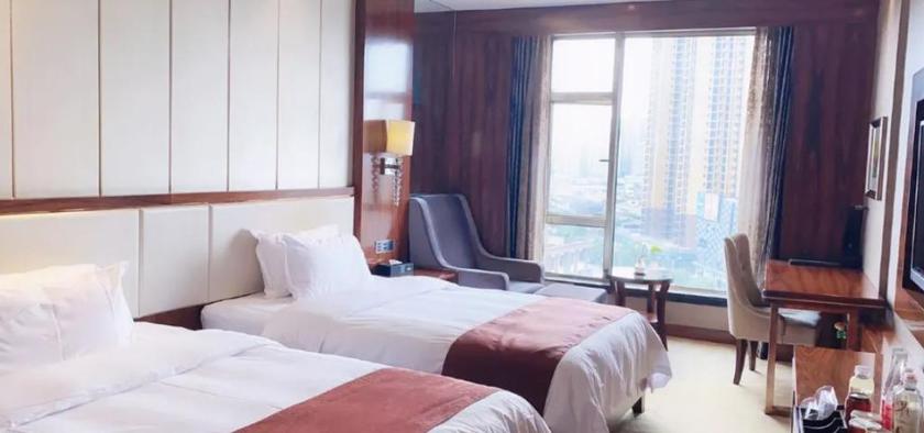 Imagen de la habitación del Hotel HUAFENG HUATIAN HOLIDAY HOTEL NINGXIANG. Foto 7