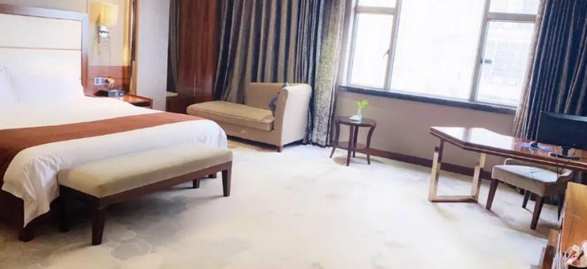 Imagen de la habitación del Hotel HUAFENG HUATIAN HOLIDAY HOTEL NINGXIANG. Foto 8