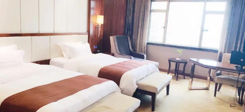 Imagen de la habitación del Hotel HUAFENG HUATIAN HOLIDAY HOTEL NINGXIANG. Foto 9