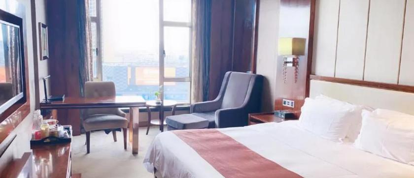 Imagen de la habitación del Hotel HUAFENG HUATIAN HOLIDAY HOTEL NINGXIANG. Foto 10