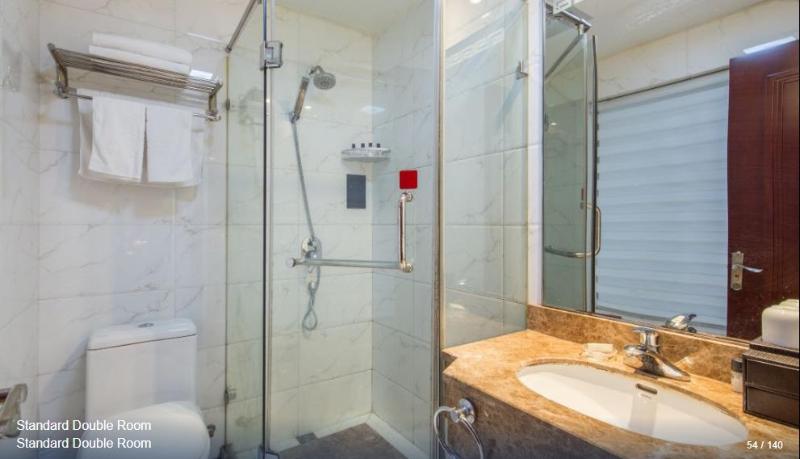 Imagen de la habitación del Hotel HUAJIANG HOTEL. Foto 6